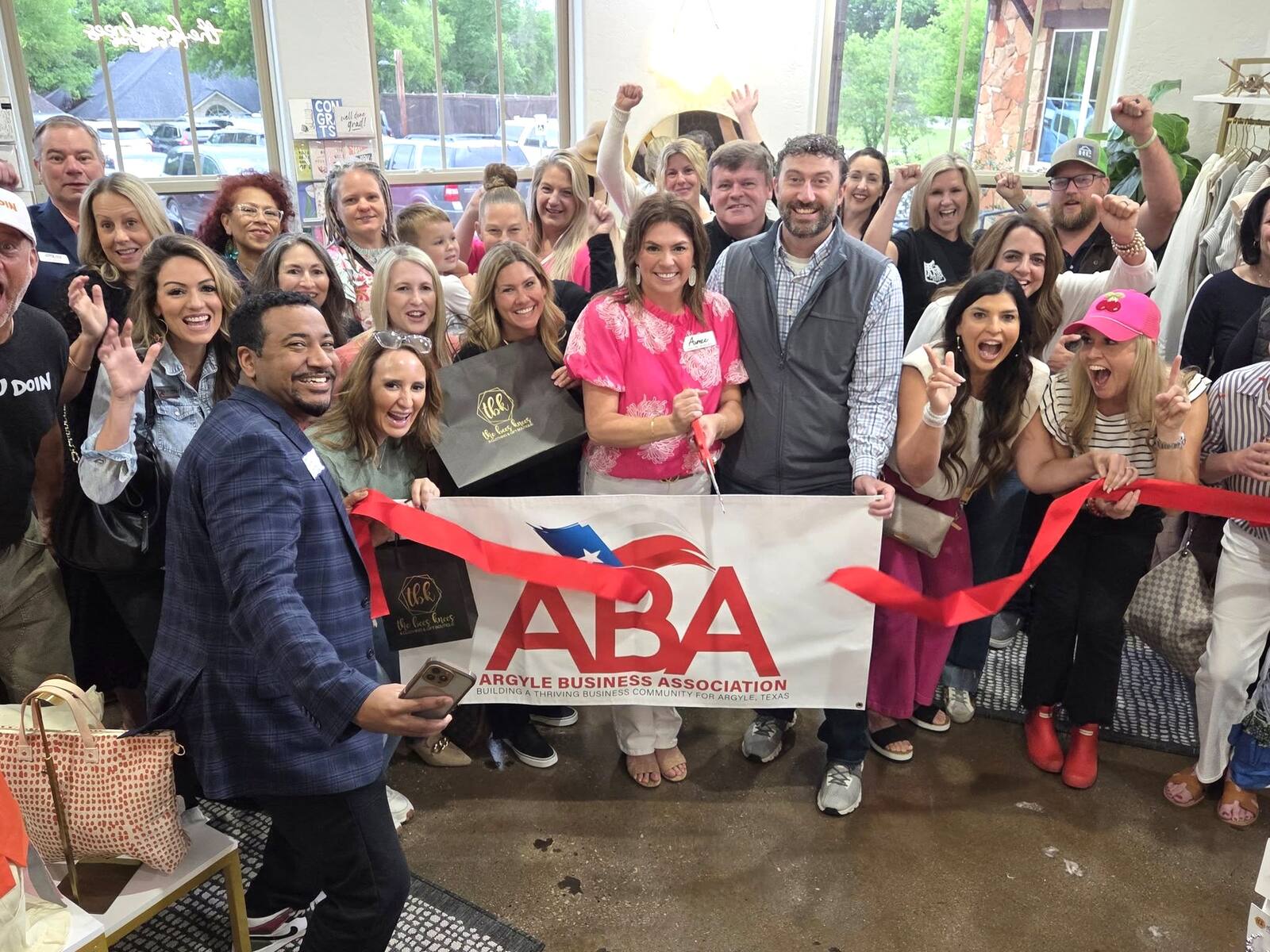 Argyle Business Association members at a local ribbon cutting